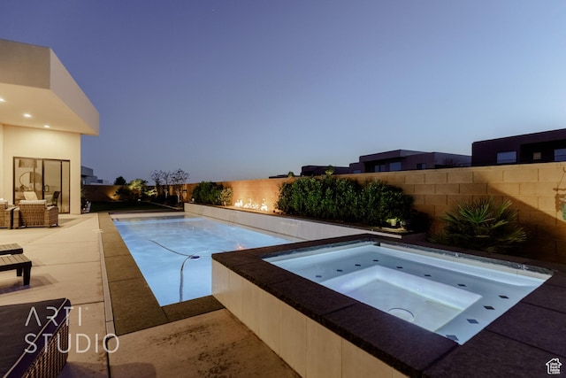 view of pool with a patio area, a fenced backyard, an in ground hot tub, and a fenced in pool