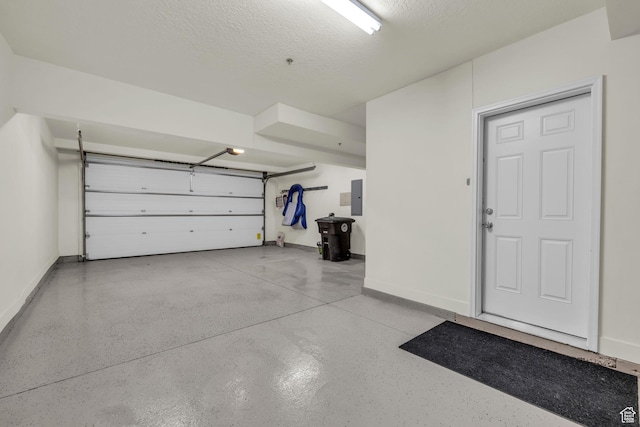 865 W Benjamin Pl, Kamas, UT 84036 - garage featuring baseboards and electric panel