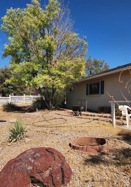 1989 W 1800 N, St George, UT 84770 - view of yard featuring an outdoor fire pit
