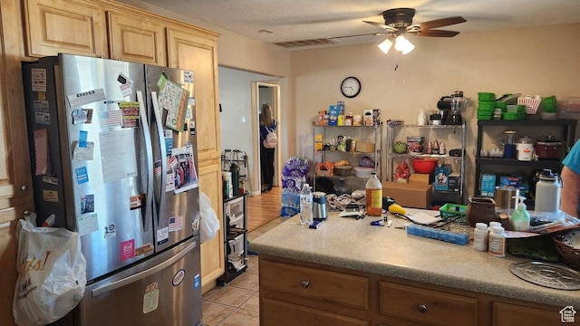 1989 W 1800 N, St George, UT 84770 - kitchen with water heater, ceiling fan, light tile patterned flooring, light brown cabinetry, and light countertops