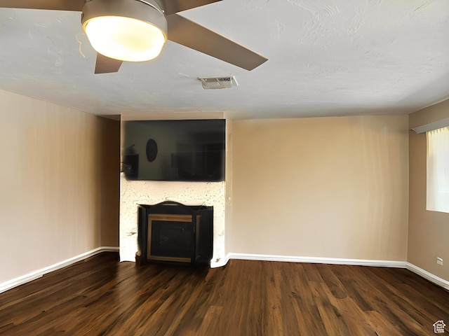 1989 W 1800 N, St George, UT 84770 - unfurnished living room featuring visible vents, baseboards, wood finished floors, and a fireplace
