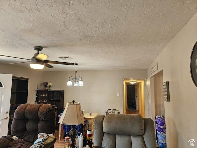 1989 W 1800 N, St George, UT 84770 - living room with a textured ceiling and ceiling fan