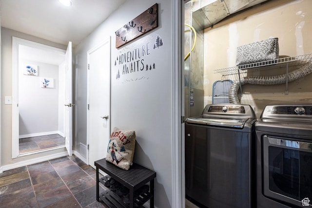 12268 N Ross Creek Dr, Kamas, UT 84036 - laundry room with separate washer and dryer, dark stone finish floors, and baseboards