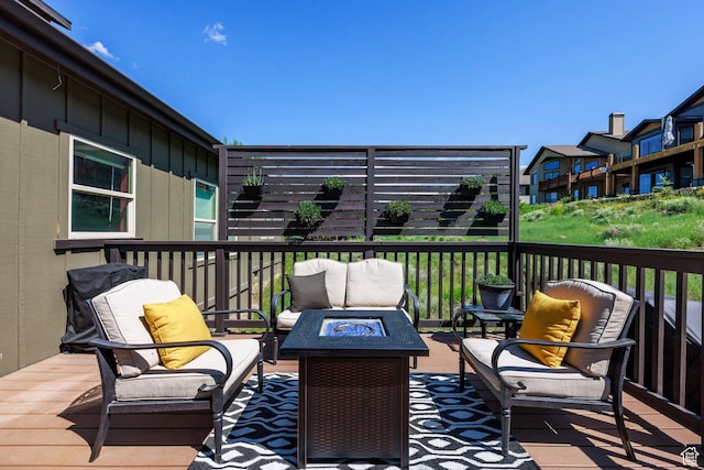 12268 N Ross Creek Dr, Kamas, UT 84036 - wooden terrace with an outdoor living space with a fire pit