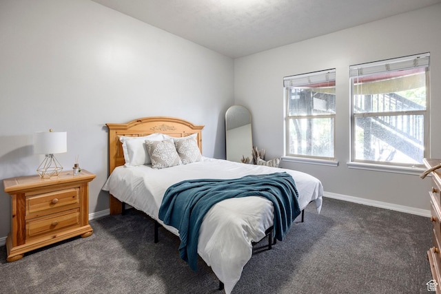 12268 N Ross Creek Dr, Kamas, UT 84036 - bedroom with dark colored carpet and baseboards