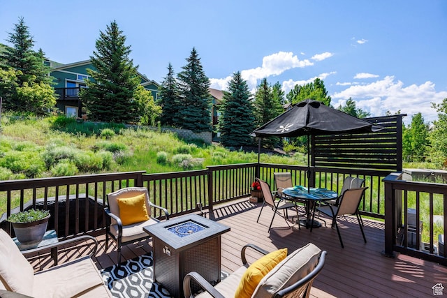 12268 N Ross Creek Dr, Kamas, UT 84036 - deck featuring an outdoor fire pit and outdoor dining space