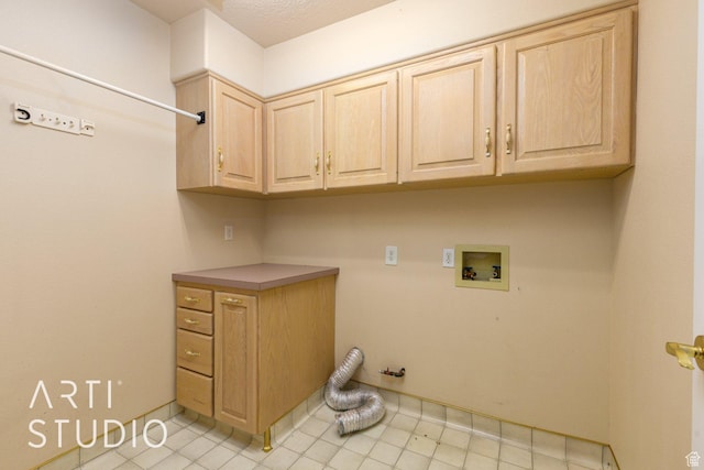 laundry area featuring cabinet space, washer hookup, and gas dryer hookup
