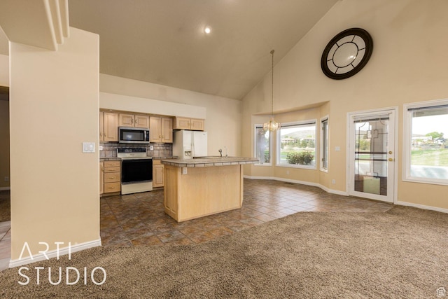 kitchen featuring dark colored carpet, electric range oven, light brown cabinetry, stainless steel microwave, and white refrigerator with ice dispenser