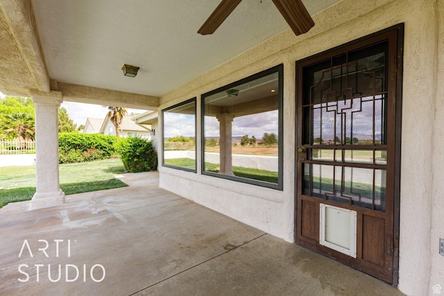 view of patio / terrace featuring ceiling fan
