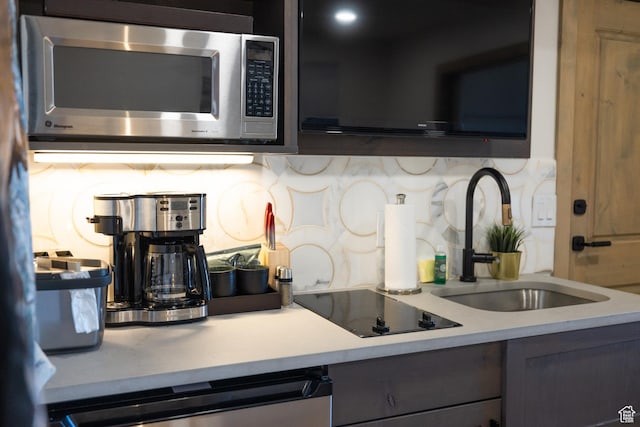 3000 Canyons Resort Dr Unit 4911B, Park City, UT 84098 - kitchen featuring tasteful backsplash, gray cabinets, appliances with stainless steel finishes, light countertops, and a sink