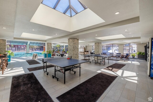 3000 Canyons Resort Dr Unit 4911B, Park City, UT 84098 - playroom with recessed lighting, ornate columns, a tray ceiling, and a skylight