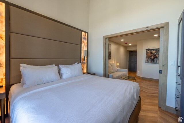 3000 Canyons Resort Dr Unit 4911B, Park City, UT 84098 - bedroom with baseboards, recessed lighting, and a high ceiling