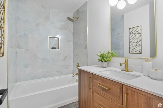 bathroom with washtub / shower combination and vanity