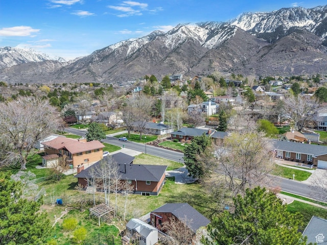 drone / aerial view featuring a mountain view and a residential view