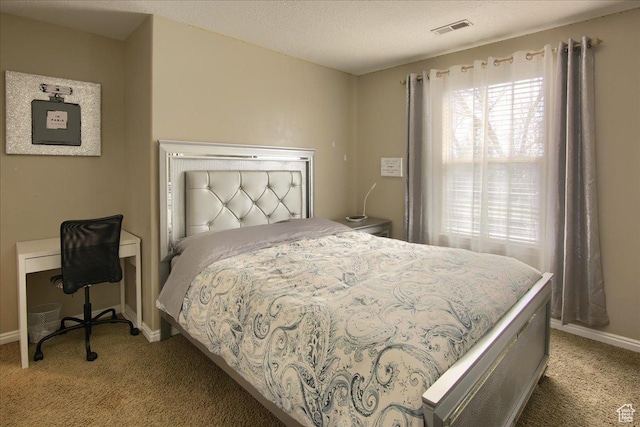 bedroom with baseboards, visible vents, light colored carpet, and multiple windows