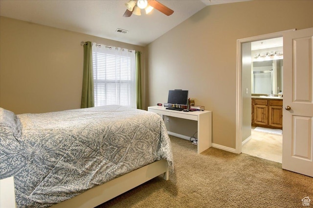 bedroom with light colored carpet, a ceiling fan, vaulted ceiling, visible vents, and baseboards