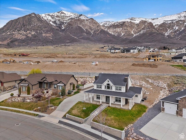 property view of mountains featuring a residential view