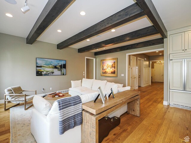 1979 E Olympus Point Dr, Holladay, UT 84117 - living room featuring an inviting chandelier, light wood-style flooring, visible vents, recessed lighting, and beam ceiling