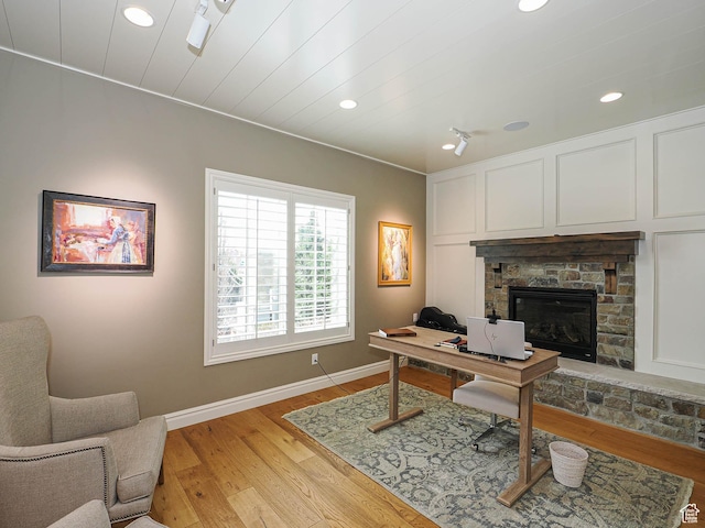 1979 E Olympus Point Dr, Holladay, UT 84117 - office area featuring light wood-style floors, a fireplace, baseboards, and recessed lighting