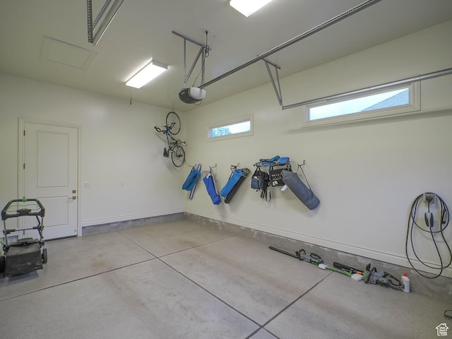 1979 E Olympus Point Dr, Holladay, UT 84117 - garage with baseboards and a garage door opener