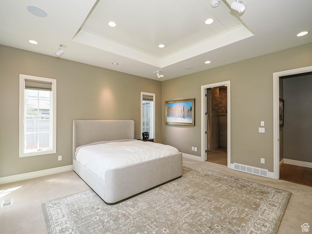 1979 E Olympus Point Dr, Holladay, UT 84117 - bedroom featuring a raised ceiling, light carpet, baseboards, and visible vents