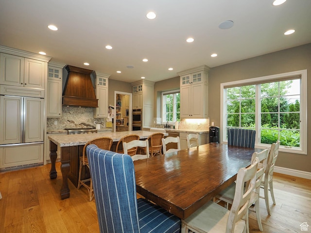 1979 E Olympus Point Dr, Holladay, UT 84117 - dining room with recessed lighting, light wood-style floors, and baseboards