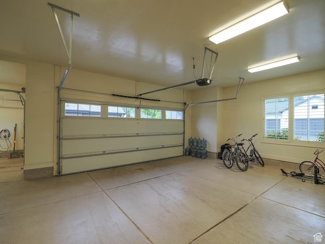 1979 E Olympus Point Dr, Holladay, UT 84117 - garage with baseboards and a garage door opener