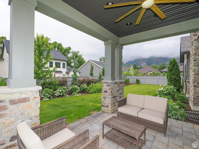 1979 E Olympus Point Dr, Holladay, UT 84117 - view of patio / terrace with an outdoor living space, a fenced backyard, and a ceiling fan
