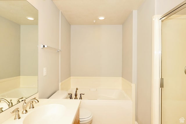 full bathroom featuring a bath, toilet, recessed lighting, vanity, and a stall shower