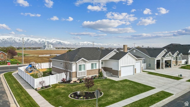 887 S 3050 W, Syracuse, UT 84075 - view of front of home featuring board and batten siding, driveway, brick siding, roof with shingles, and an attached garage