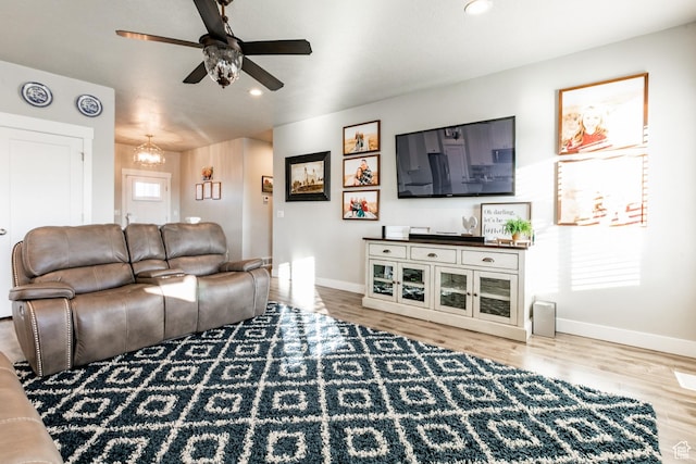 887 S 3050 W, Syracuse, UT 84075 - living room featuring ceiling fan, wood finished floors, baseboards, and recessed lighting