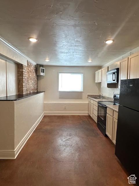 56 E Center St Unit 1, Richfield, UT 84701 - kitchen featuring black appliances, recessed lighting, a wall mounted AC, and concrete flooring