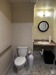 56 E Center St Unit 1, Richfield, UT 84701 - half bathroom with toilet and a sink