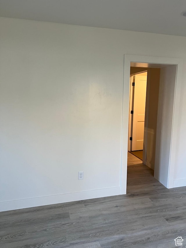 56 E Center St Unit 1, Richfield, UT 84701 - empty room featuring wood finished floors and baseboards