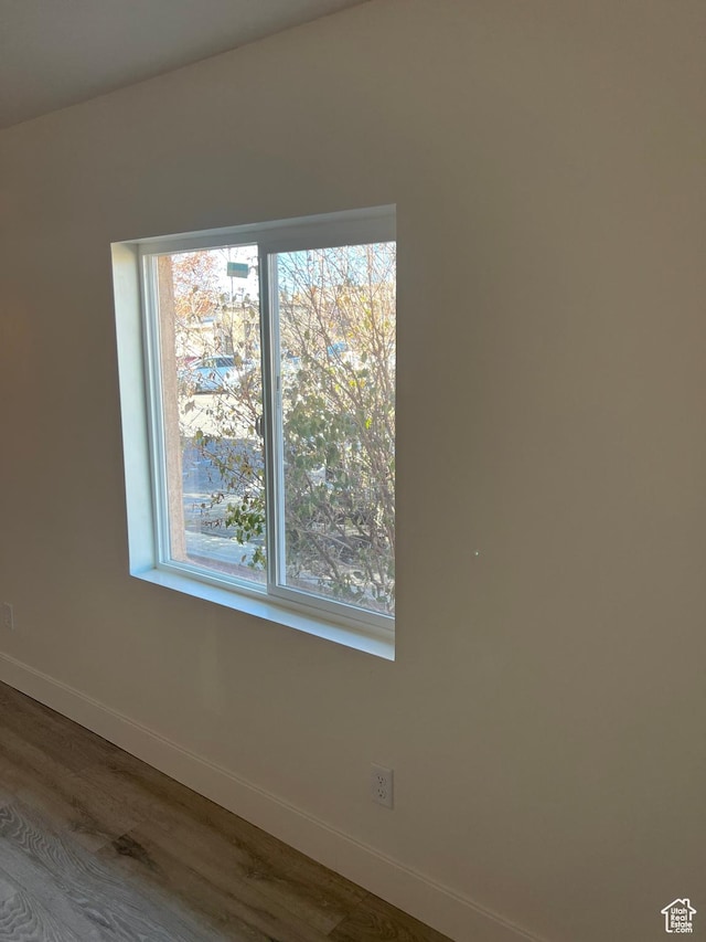 56 E Center St Unit 1, Richfield, UT 84701 - unfurnished room featuring baseboards and wood finished floors