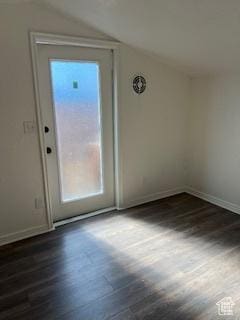 56 E Center St Unit 1, Richfield, UT 84701 - interior space featuring baseboards, lofted ceiling, and dark wood-style floors