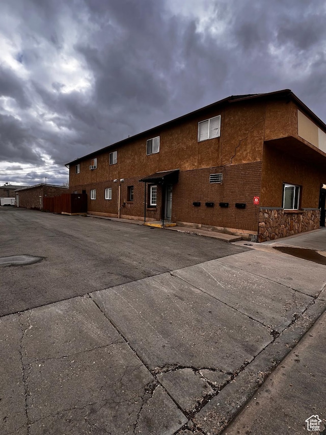 56 E Center St Unit 1, Richfield, UT 84701 - view of home's exterior featuring stone siding
