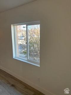 56 E Center St Unit 1, Richfield, UT 84701 - spare room featuring wood finished floors and baseboards