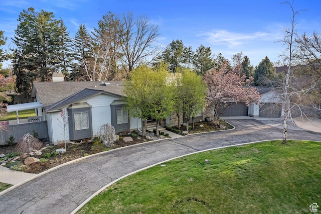 1850 E Cottonwood Club Dr, Holladay, UT 84117 - view of front of home with a chimney, aphalt driveway, fence, a front lawn, and roof with shingles