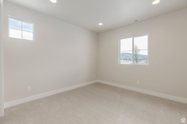 2989 Rock View Dr Unit 105, Francis, UT 84036 - carpeted empty room featuring recessed lighting, visible vents, and baseboards