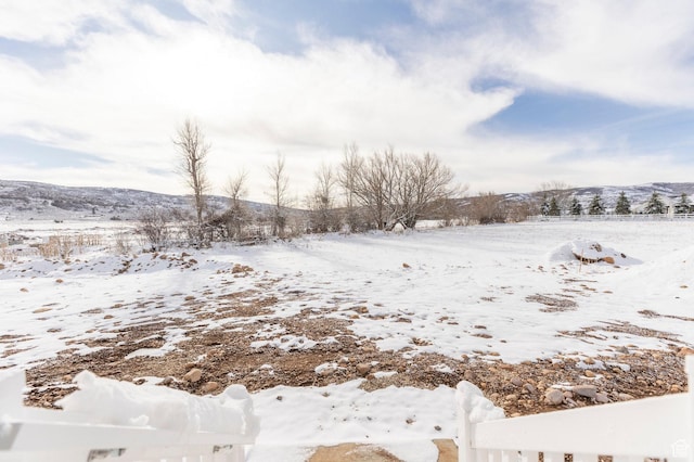 2989 Rock View Dr Unit 105, Francis, UT 84036 - snowy yard featuring a mountain view