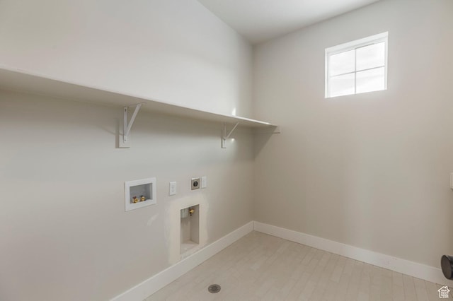 2989 Rock View Dr Unit 105, Francis, UT 84036 - laundry area featuring electric dryer hookup, laundry area, baseboards, and washer hookup