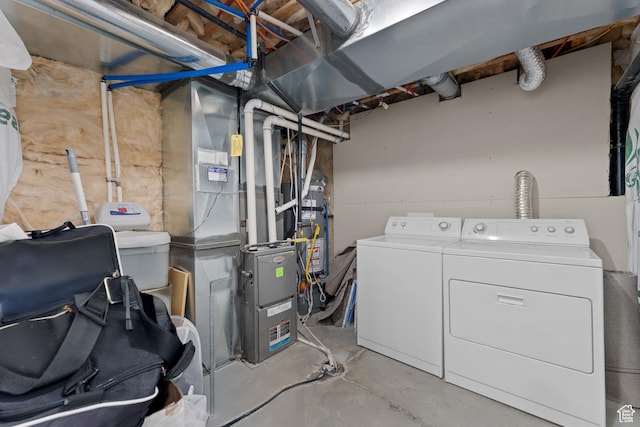 unfinished below grade area with washing machine and dryer
