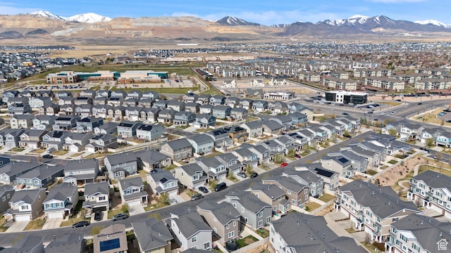 drone / aerial view featuring a mountain view and a residential view
