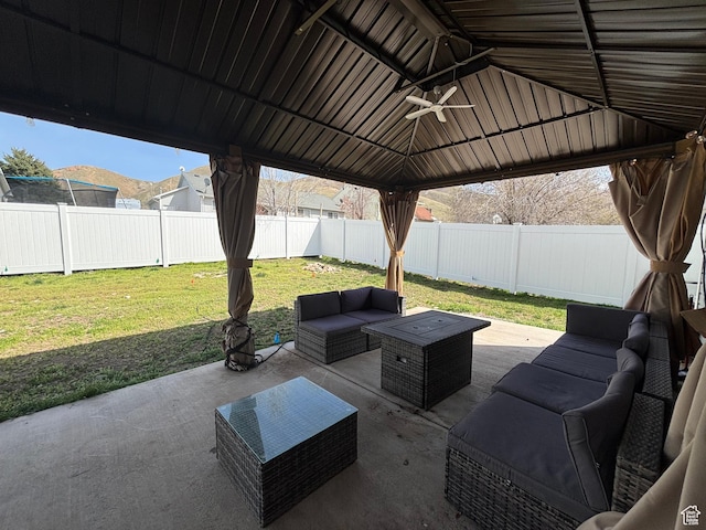 1081 S 900 W, Tooele, UT 84074 - view of patio / terrace with a gazebo, a fenced backyard, and outdoor lounge area
