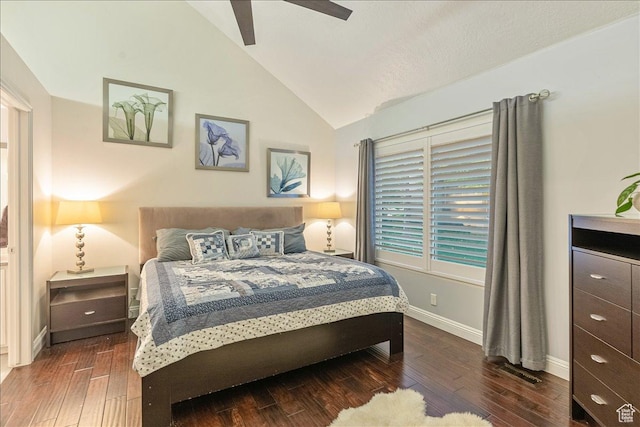 bedroom featuring wood finished floors, ceiling fan, baseboards, and lofted ceiling