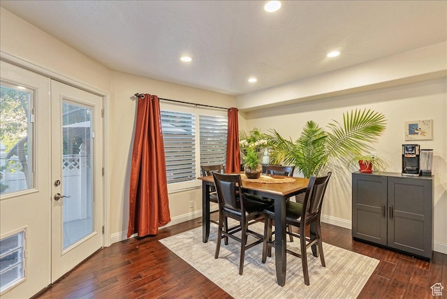 dining room featuring baseboards, recessed lighting, heating unit, and dark wood finished floors