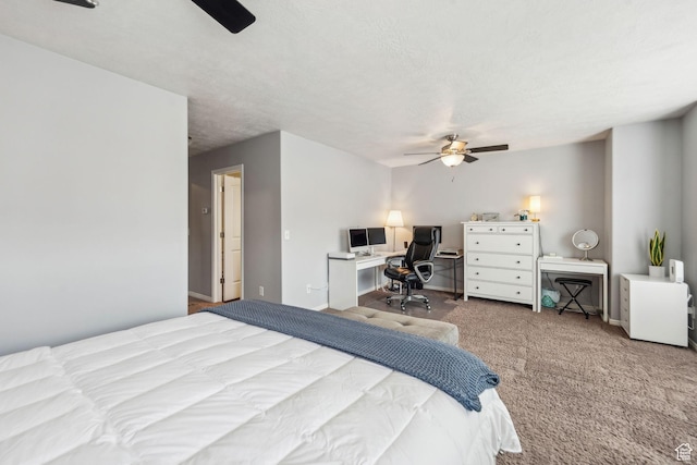 bedroom featuring baseboards, a ceiling fan, and carpet