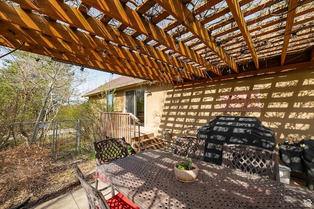 2406 Woodland Dr, Ogden, UT 84403 - view of patio / terrace featuring outdoor dining space, a pergola, and fence