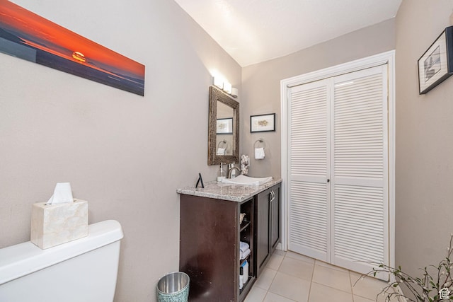 2406 Woodland Dr, Ogden, UT 84403 - bathroom featuring toilet, tile patterned floors, and vanity